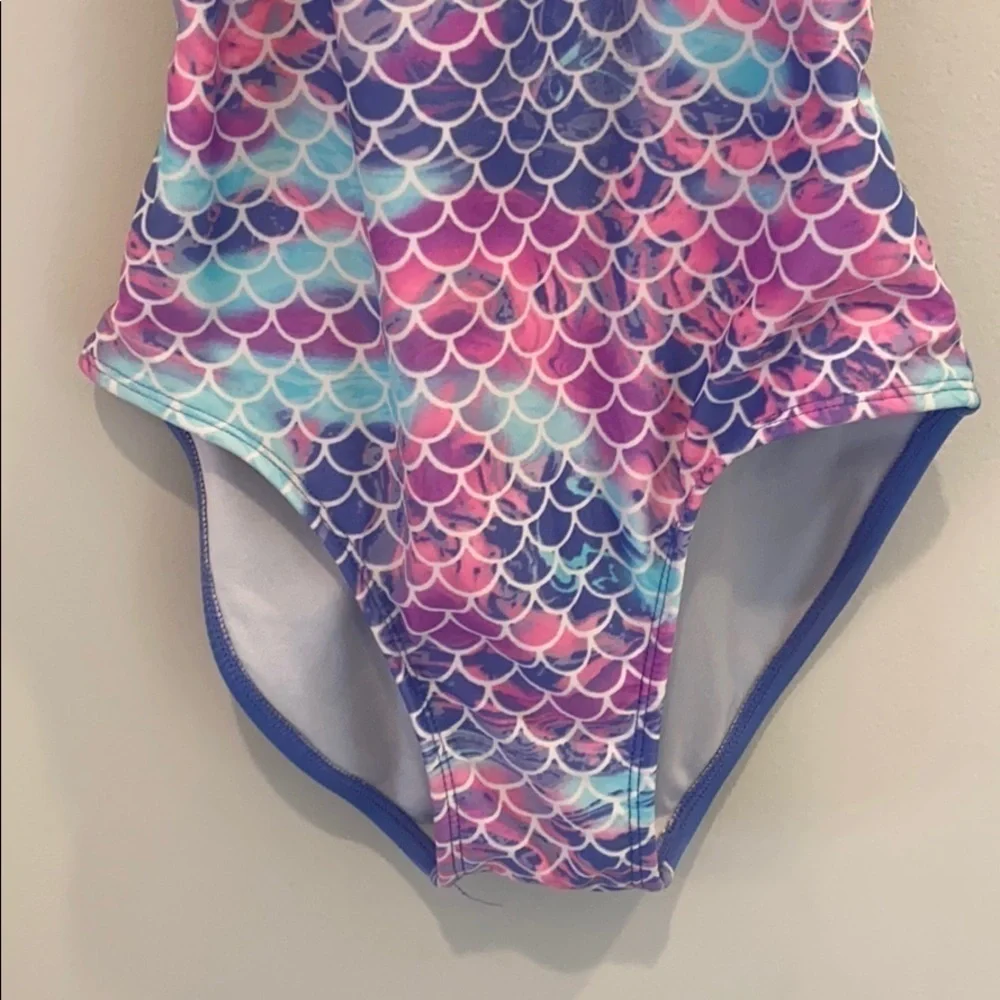 More than Magic girls one piece bathing suit.  Size large